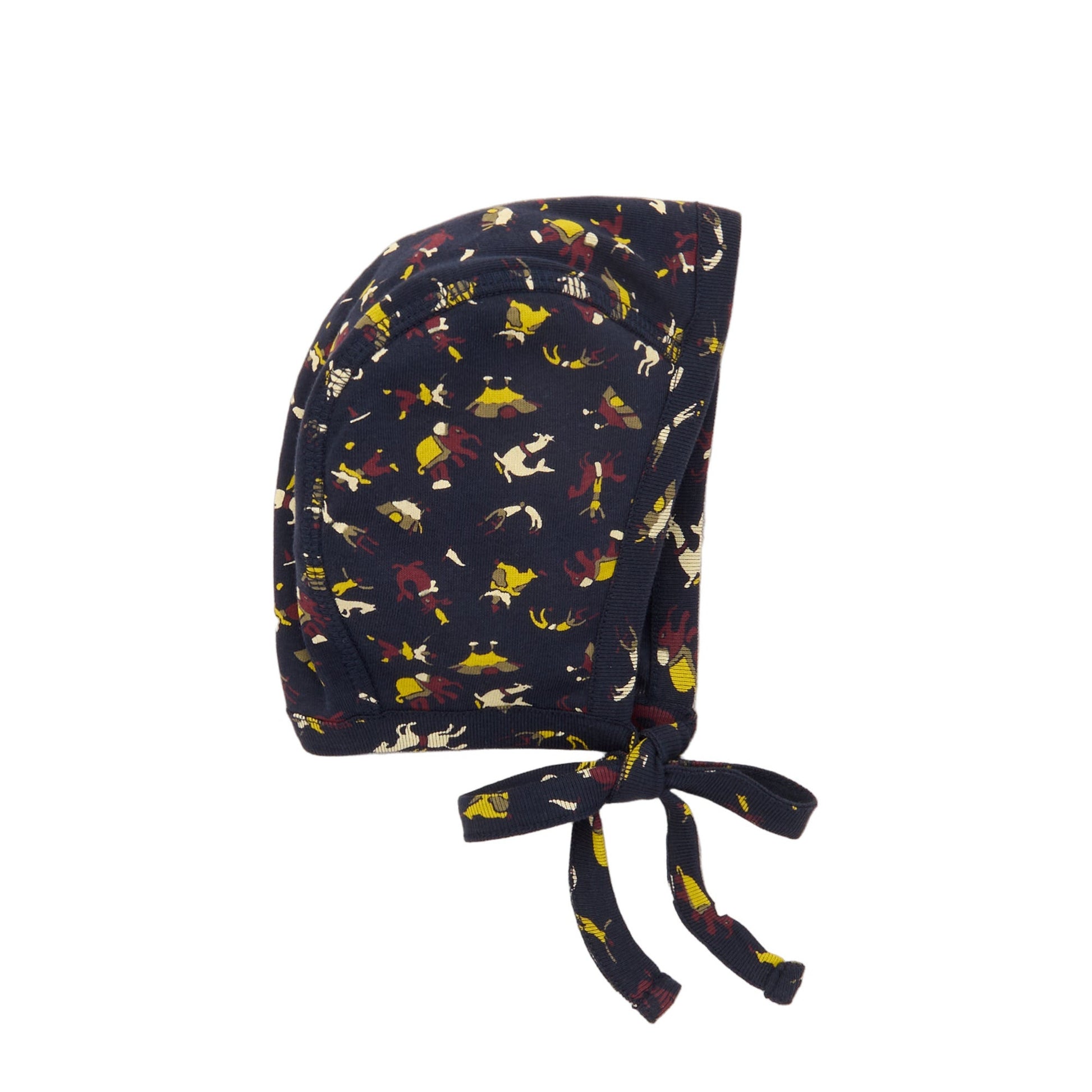 Baby bonnet with fox pattern on a white background