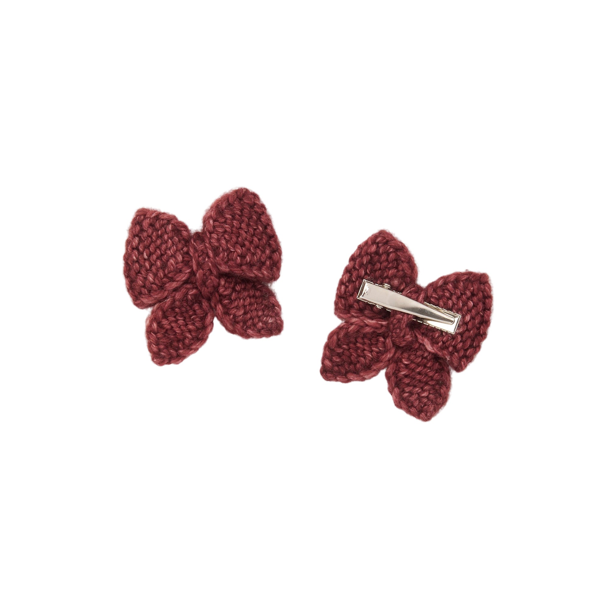 Two maroon butterfly-shaped hair clips on a light beige background - Little-ish
