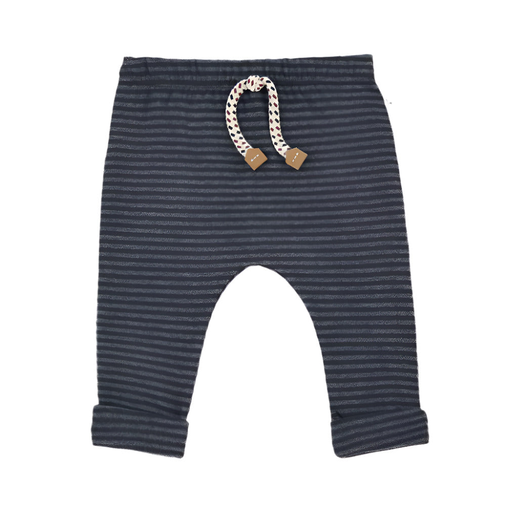 Striped baby pants with a rattle on a white background - Little-ish
