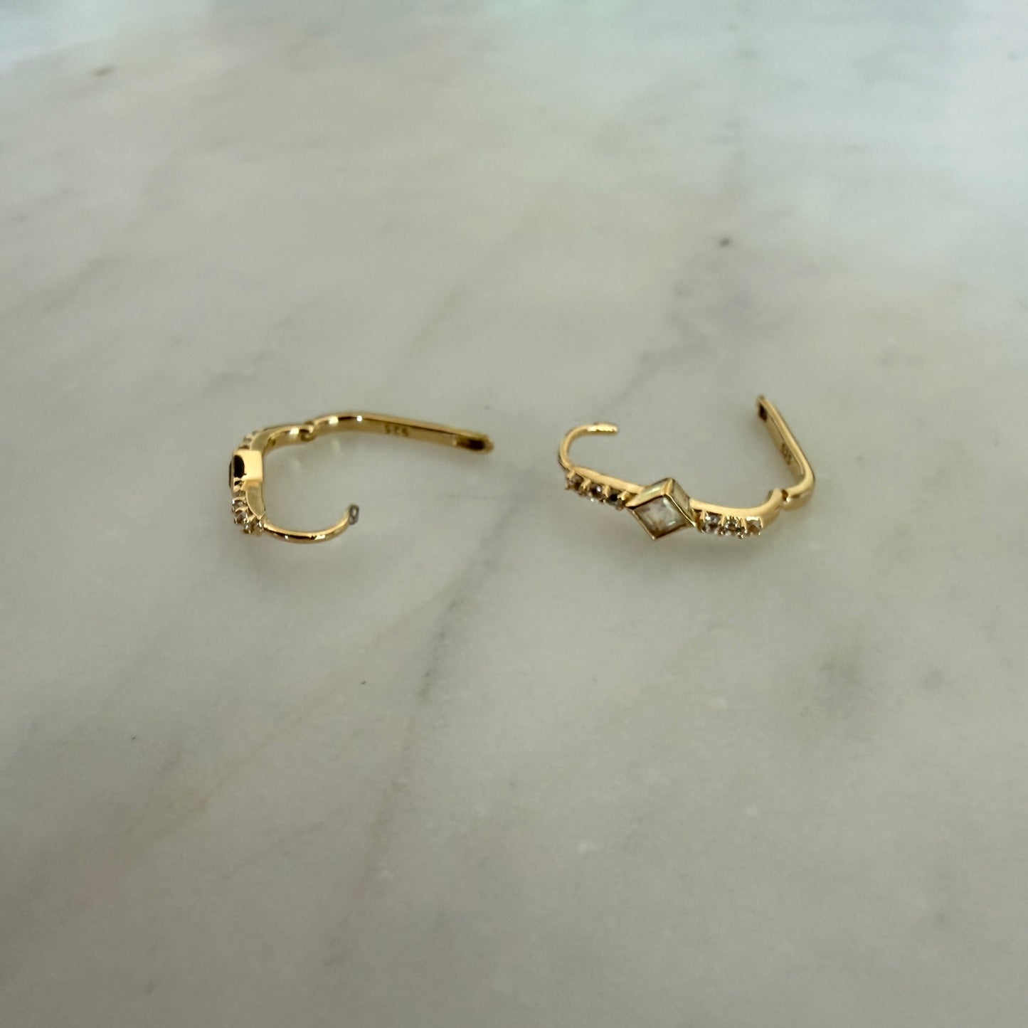 BLUE TOPAZ & WHITE QUARTZ HUGGIE HOOPS