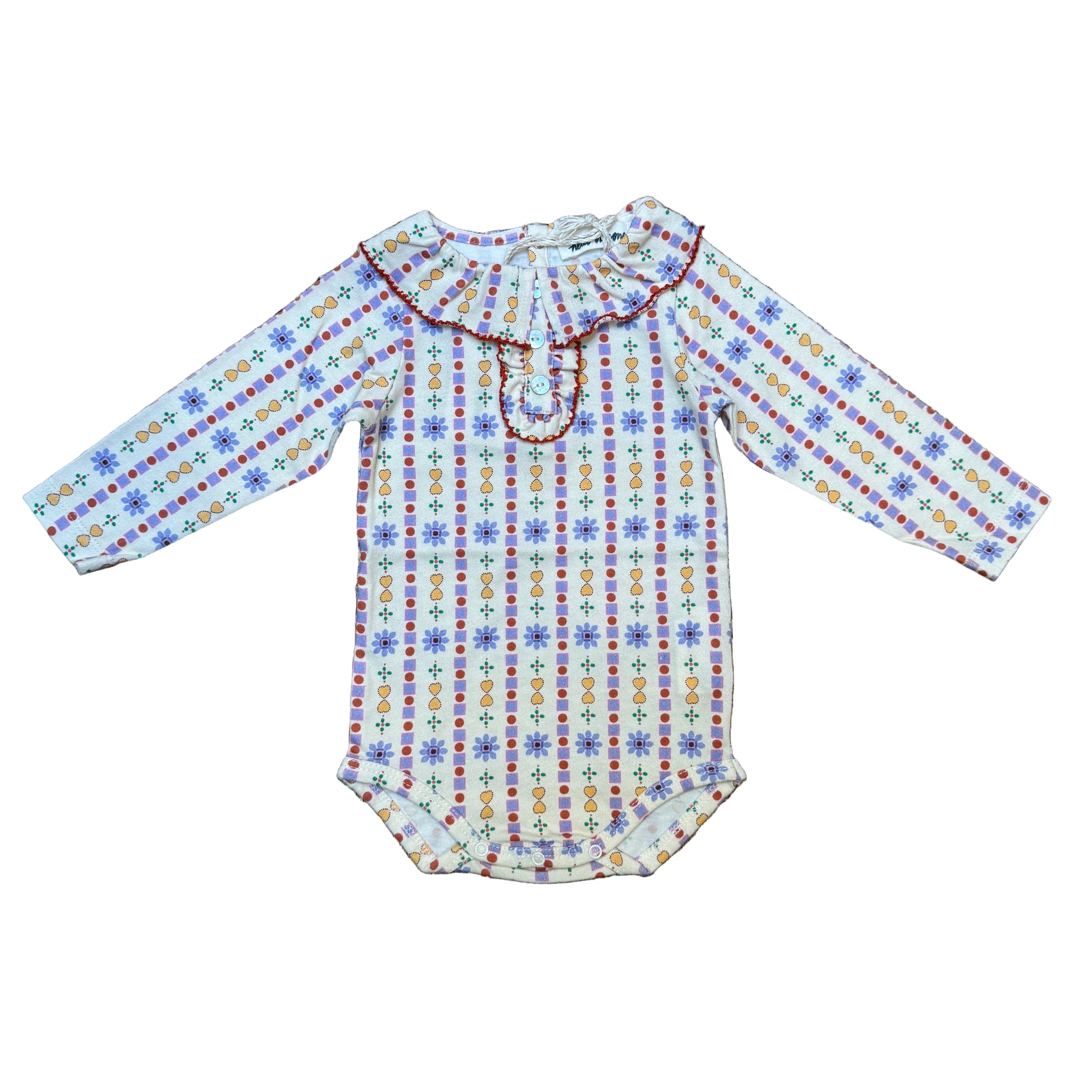 Colorful patterned fabric on a textured surface - Little-ish