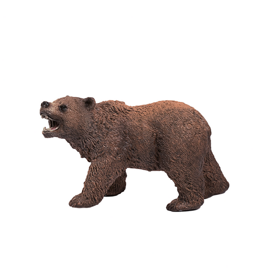 Brown bear figurine on a white background