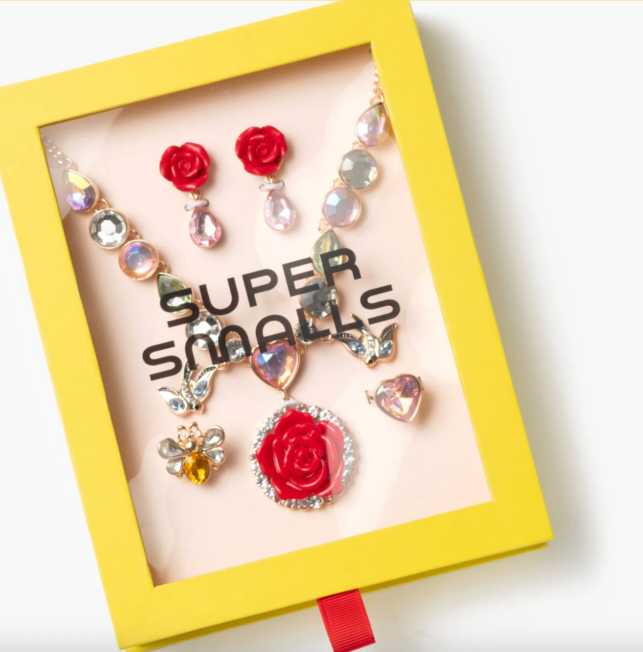 Jewelry set with necklaces and earrings in a 'Super Smalls' box