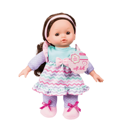 Doll with a colorful outfit and a pink tag on a white background