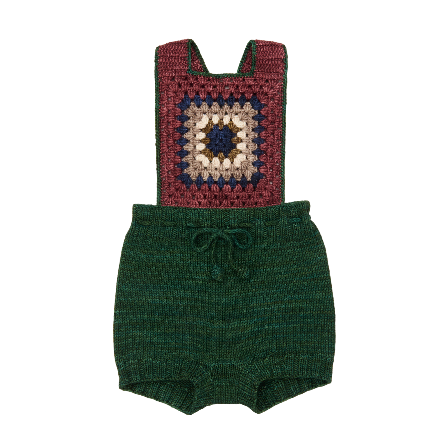 Green knitted romper with a colorful crochet bib on a white background
