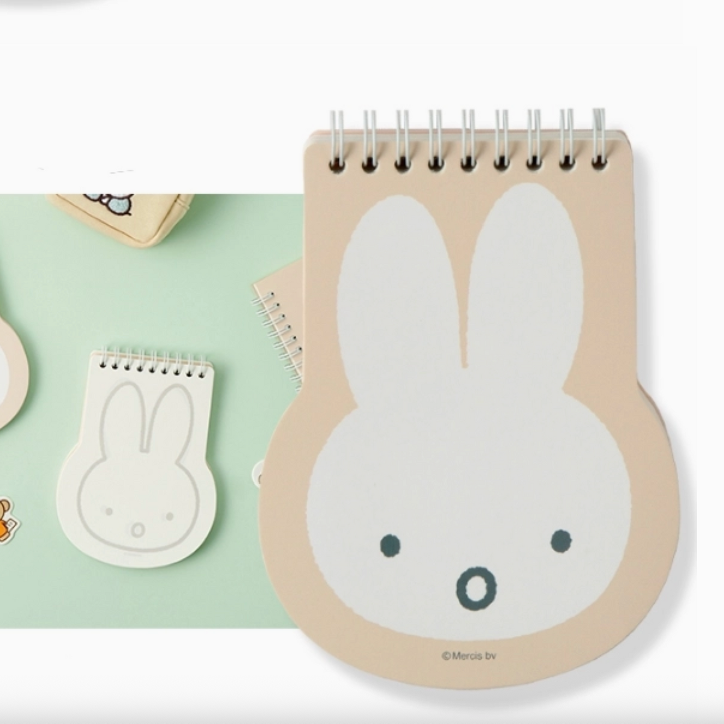 Notebook with rabbit design on a light green background