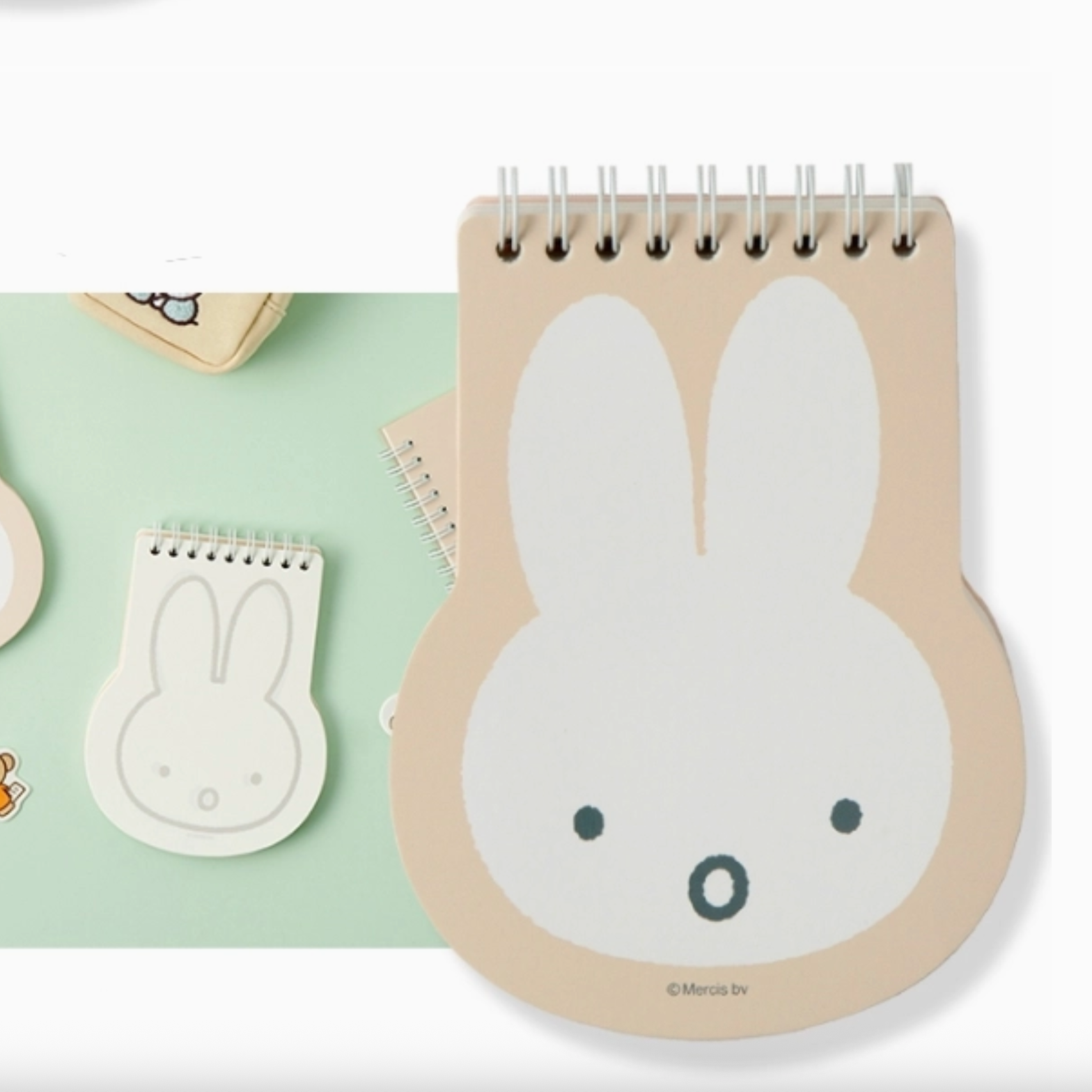 Notebook with rabbit design on a light green background