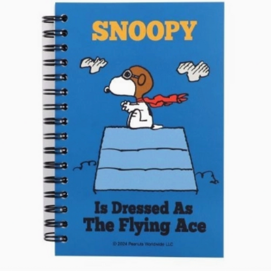 Notebook with Snoopy design on a blue background