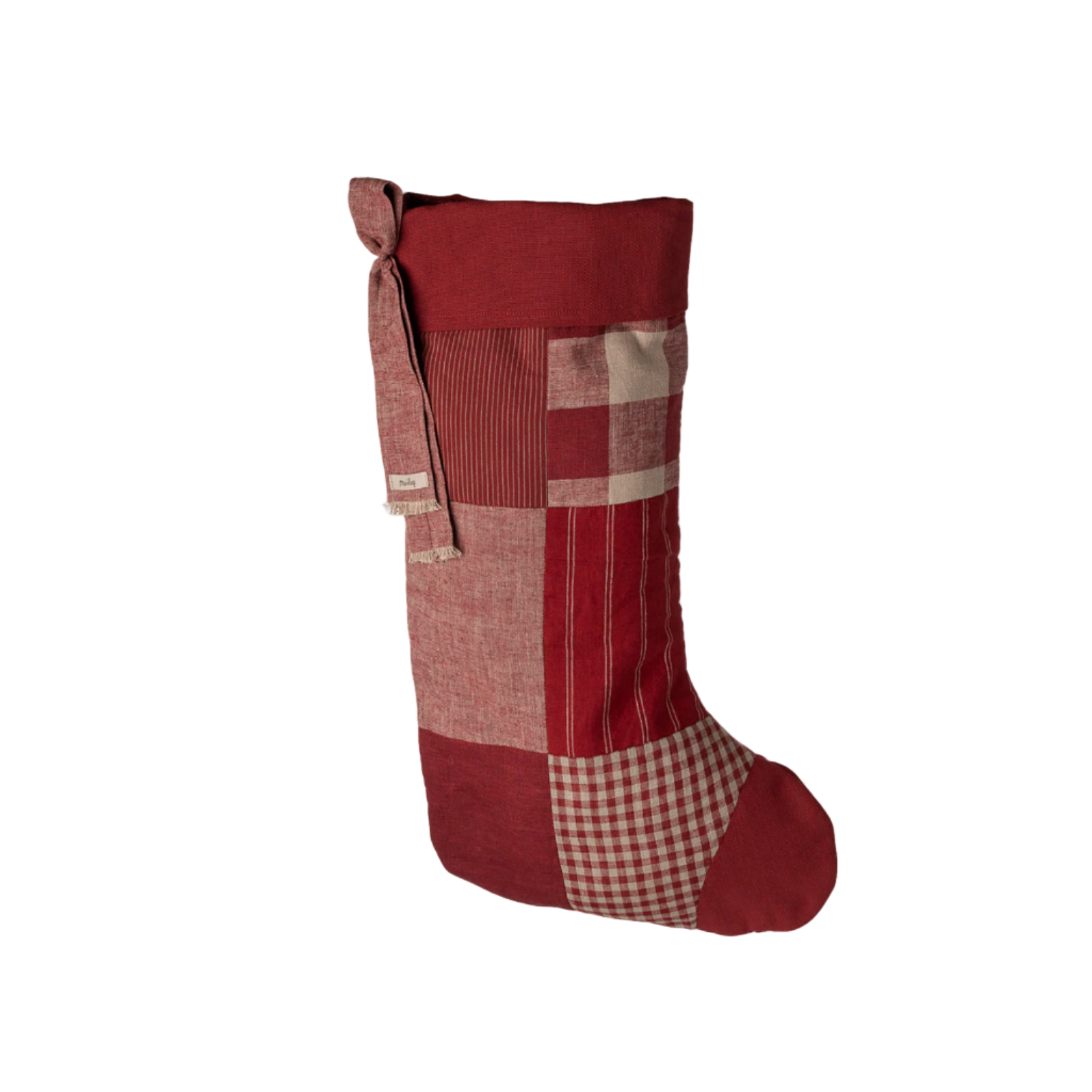 Red and checkered Christmas stocking on a white background - Little-ish