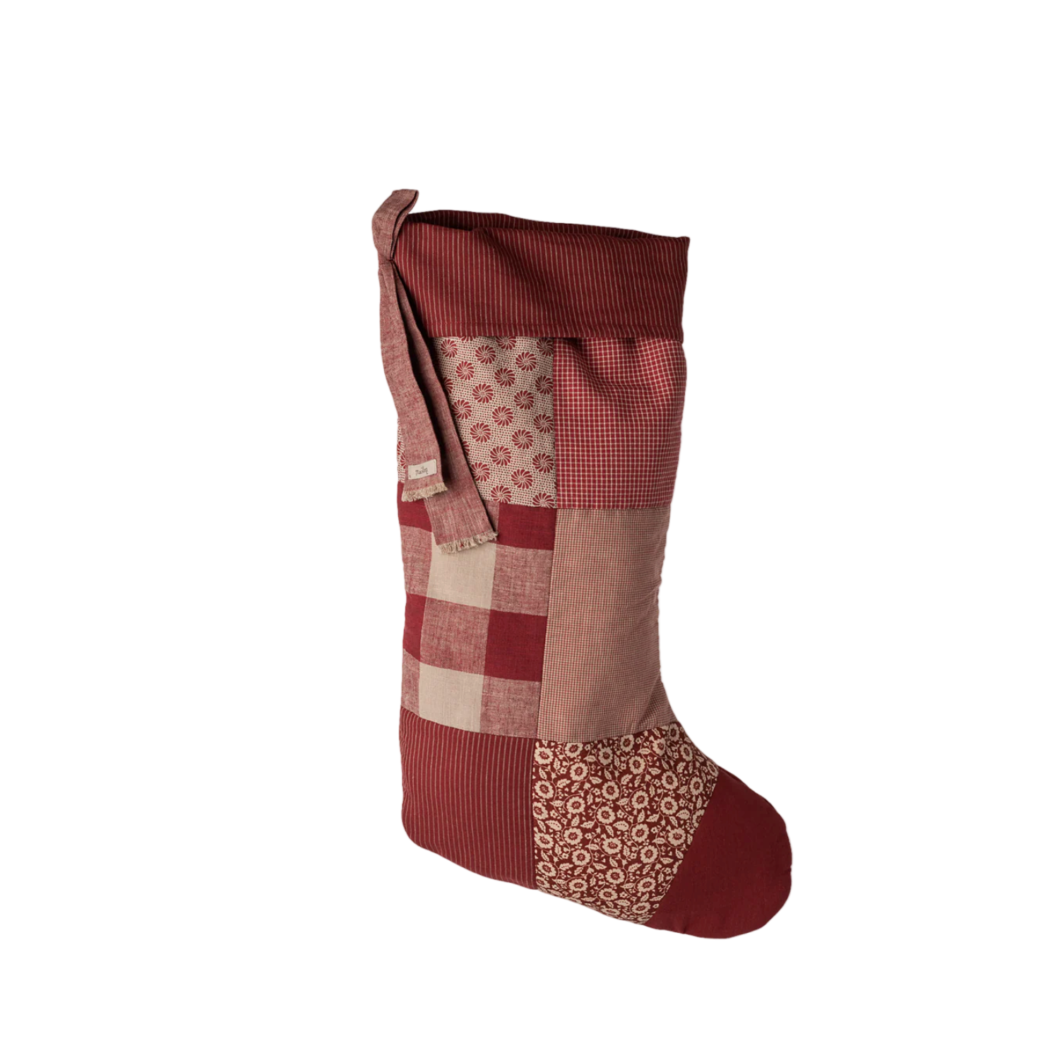 Patchwork-style red and brown stocking on a white background - Little-ish