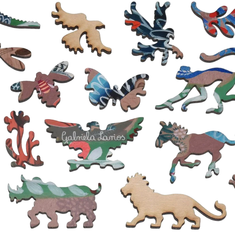 Collection of colorful animal figurines on a white background - Little-ish