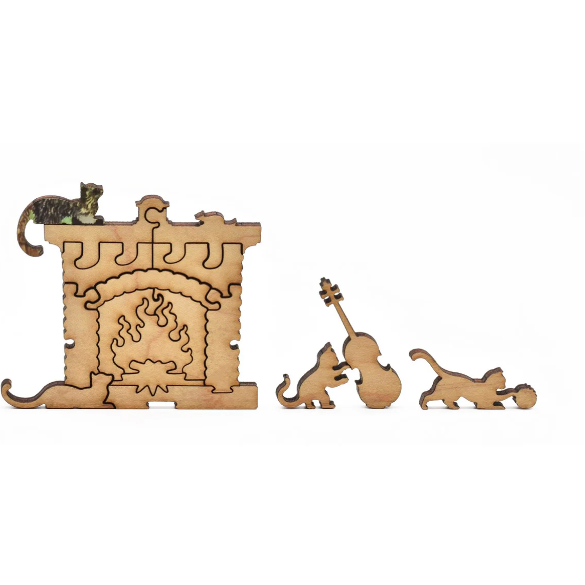 Wooden puzzle with a fireplace and cat figures on a white background