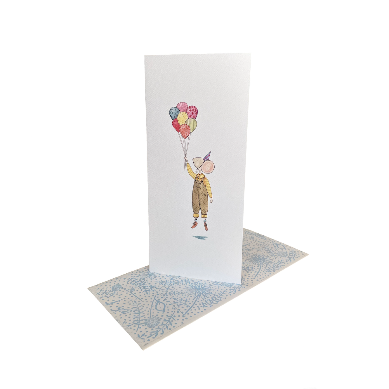 Note card with a design of a person holding balloons on a computer screen.