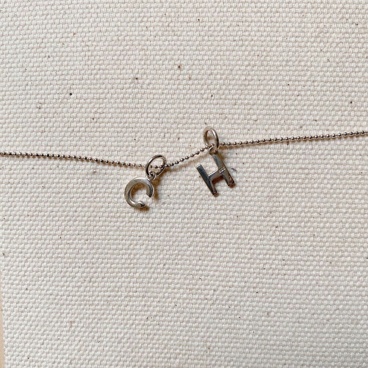 SILVER INITIAL CHARM