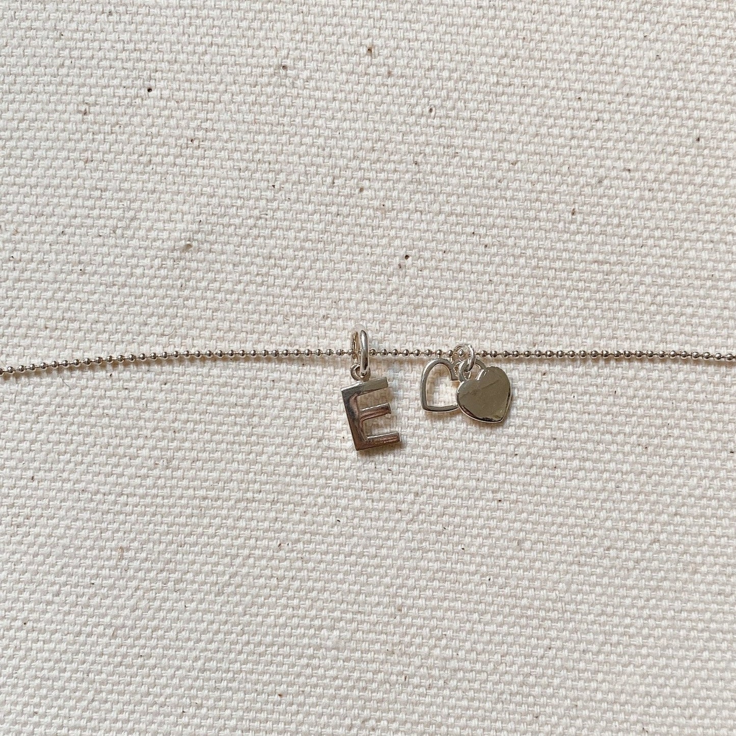 SILVER INITIAL CHARM