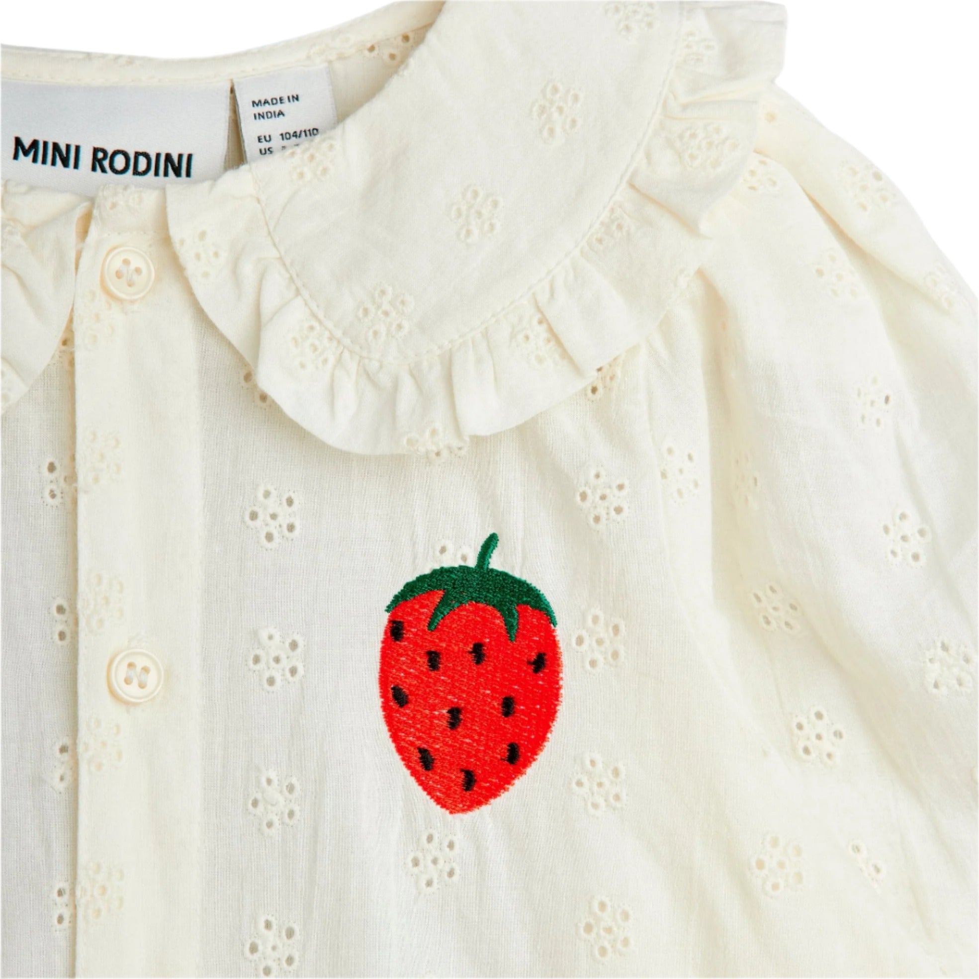 White shirt with strawberry design and Mini Rodini label on a white background - Little-ish