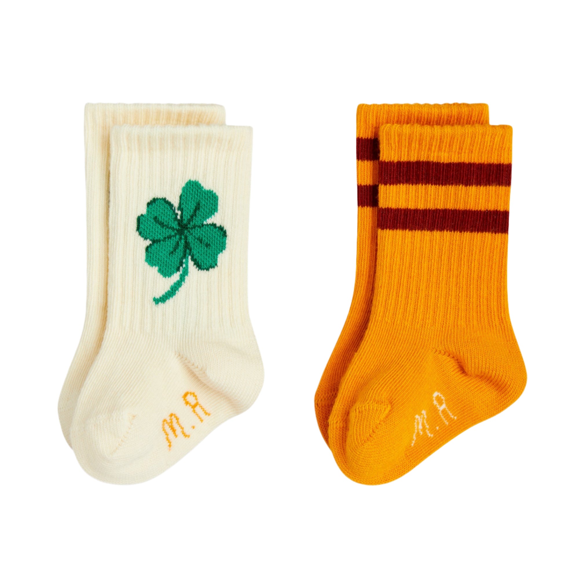 Two pairs of socks, one with a clover design and the other with stripes, on a white background. - Little-ish
