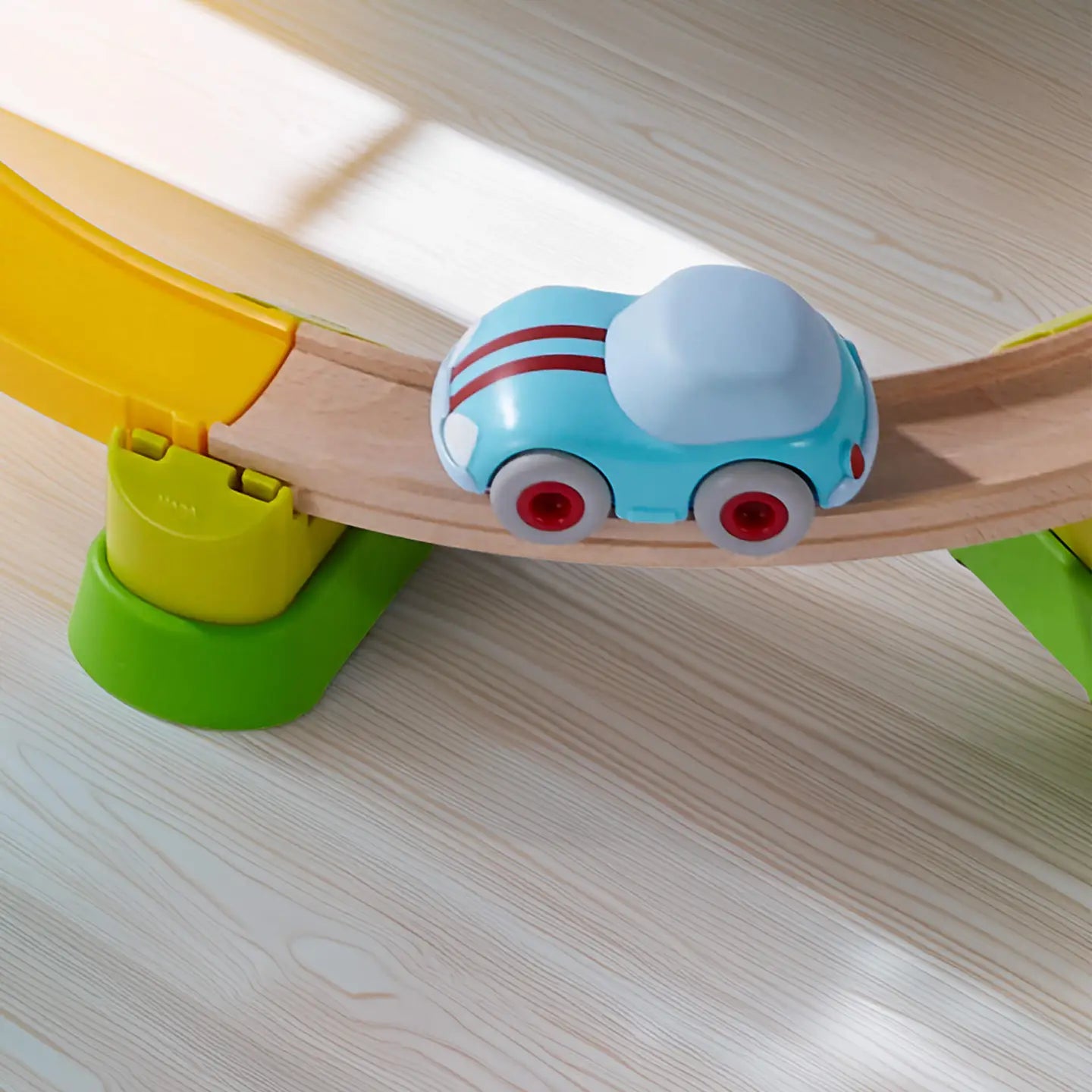 HABA LIGHT BLUE SPEEDSTER WITH MOMENTUM MOTOR