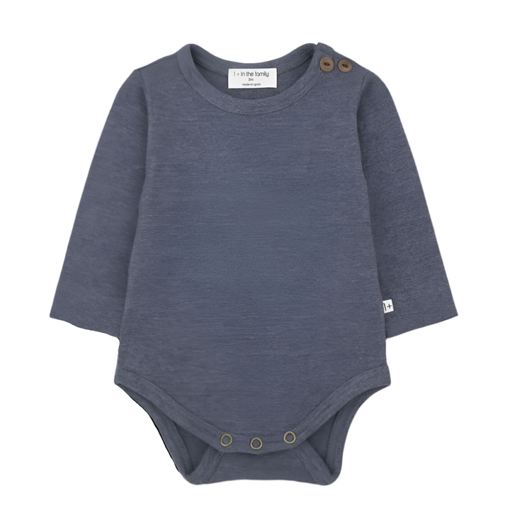Blue baby bodysuit with brown buttons on a white background