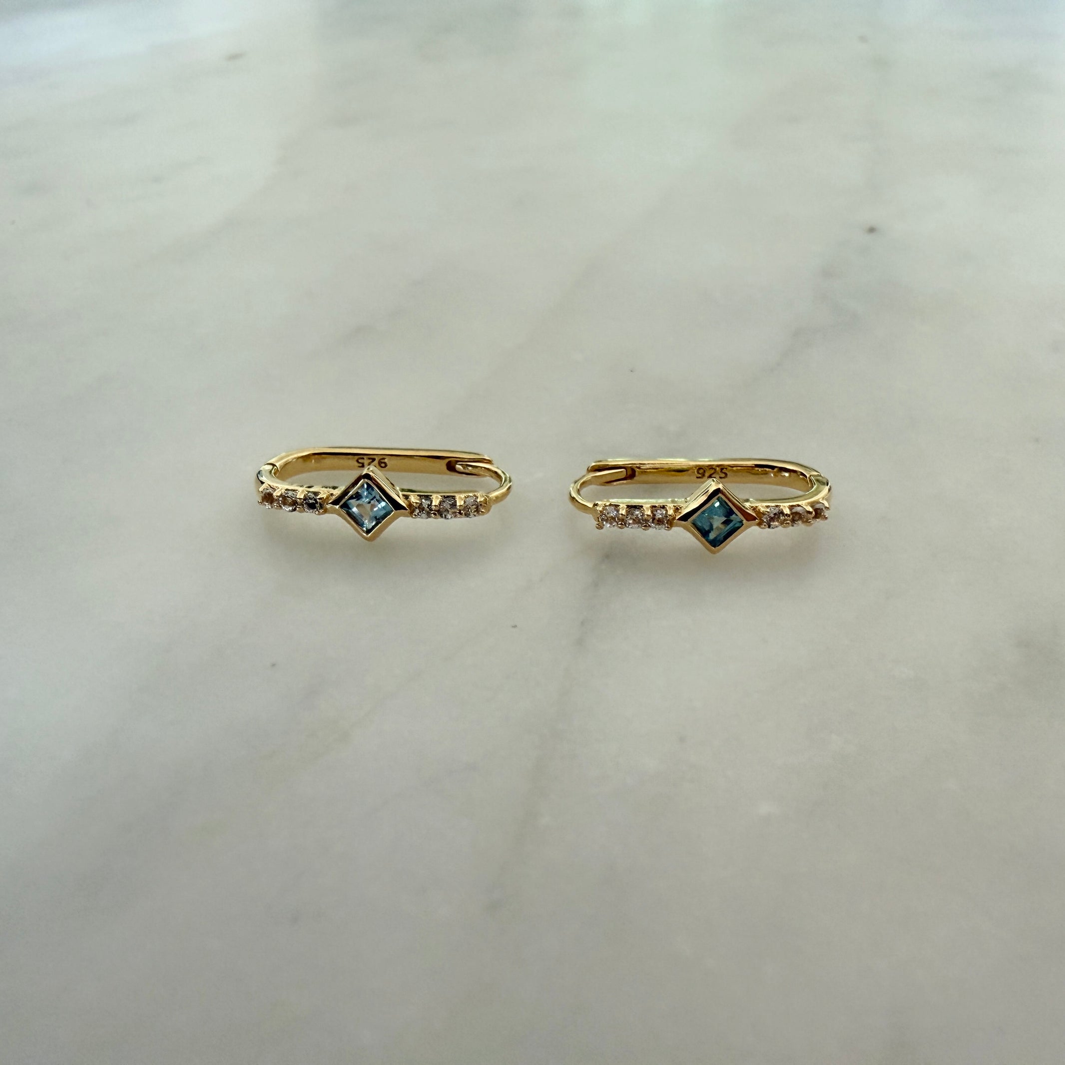 BLUE TOPAZ & WHITE QUARTZ HUGGIE HOOPS - Little-ish