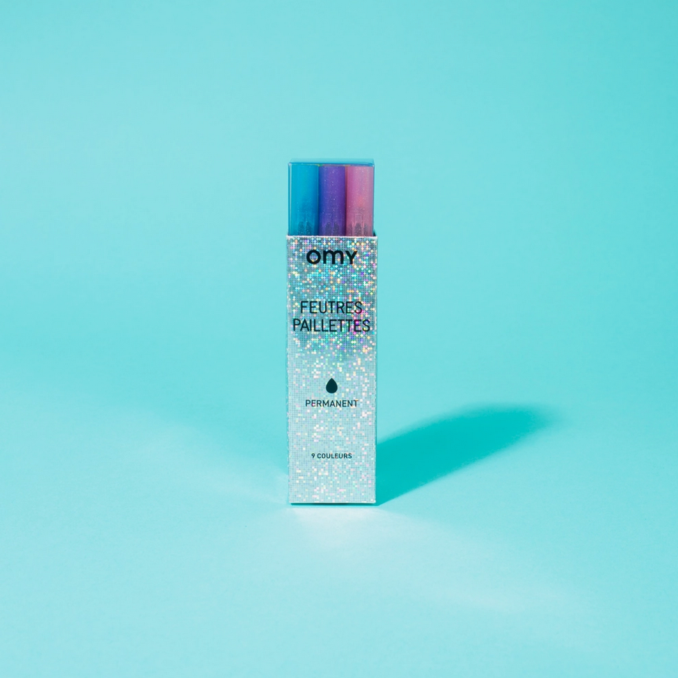 Omy Feuers Palette makeup product on a light blue background - Little-ish