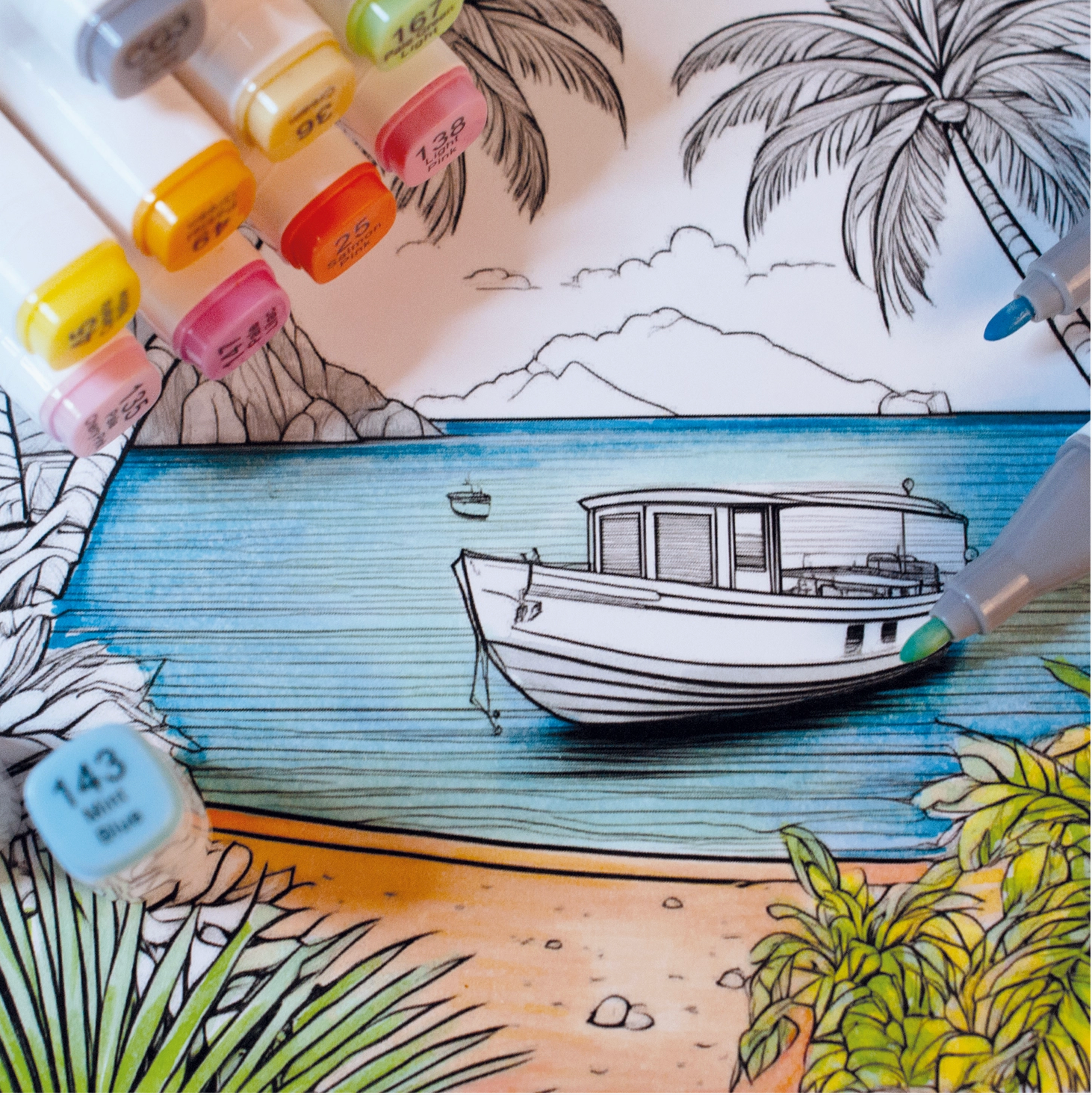 Coloring book page with a boat and beach scene, markers on the side. - Little-ish