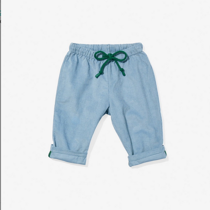 Light blue baby pants with a green drawstring on a white background