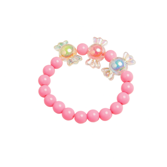 Pink beaded bracelet with decorative charms on a light gray background