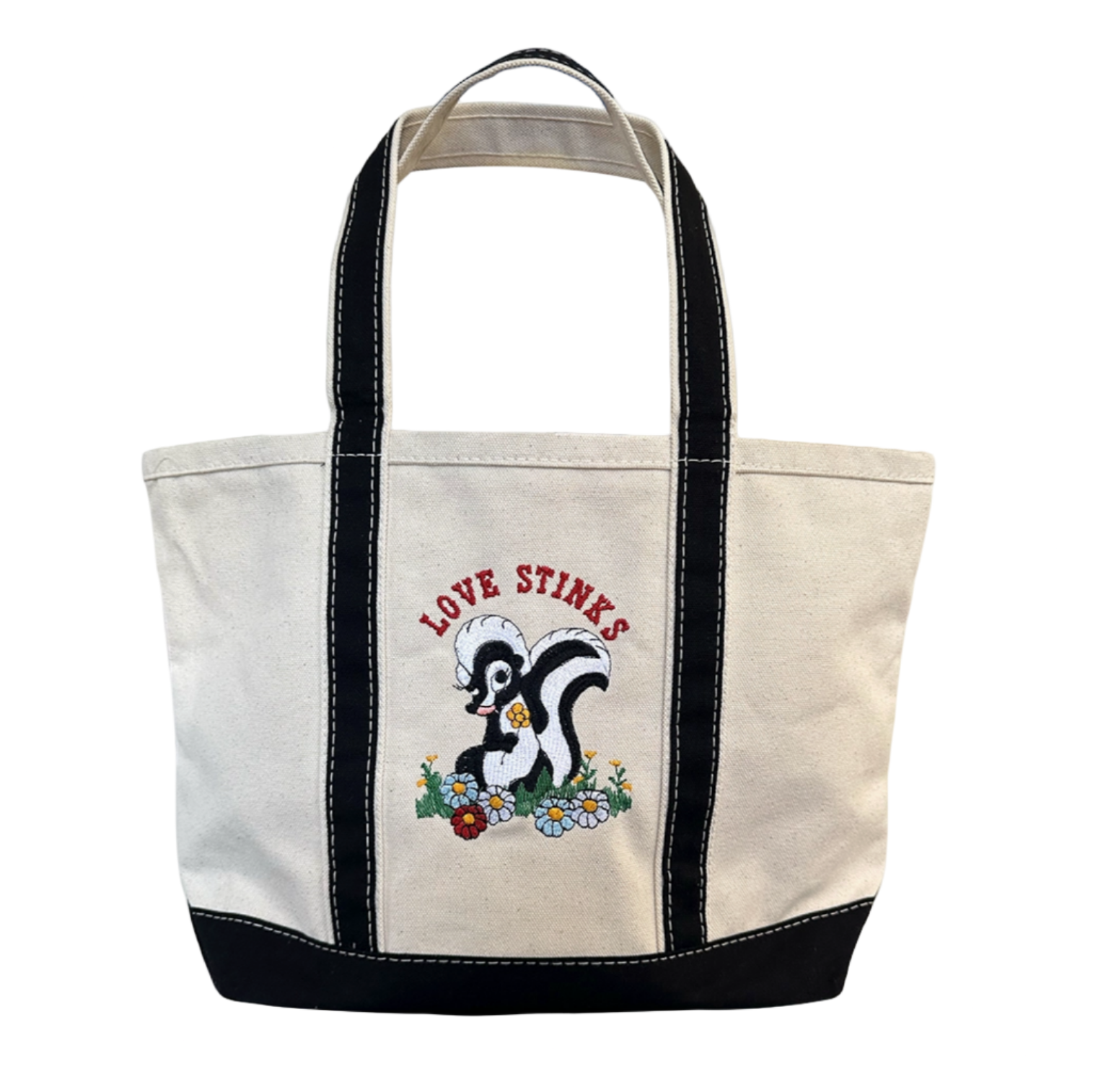 Tote bag with a skunk design and 'Love Stinks' text on a white background - Little-ish