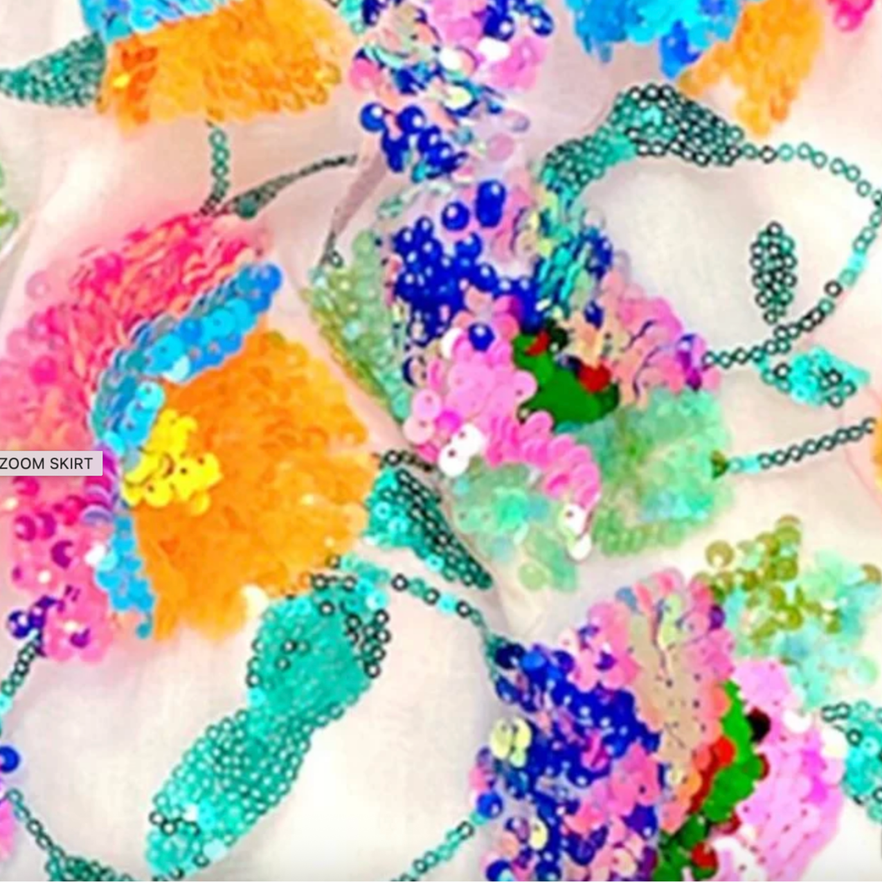 Colorful sequin fabric with multicolored sequins on a white background