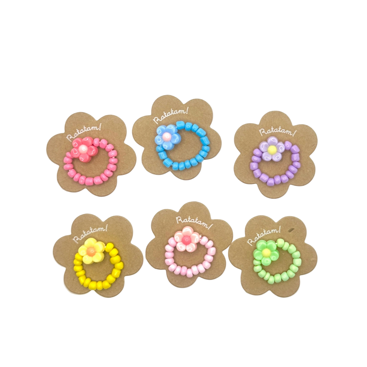 Set of six floral hair ties with colorful beads on a white background - Little-ish