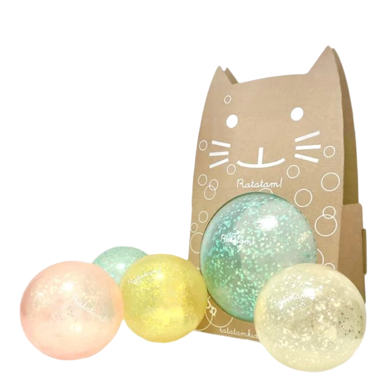 Three glittery balls in pastel colors with a cardboard box featuring a cat design on a white background. - Little-ish