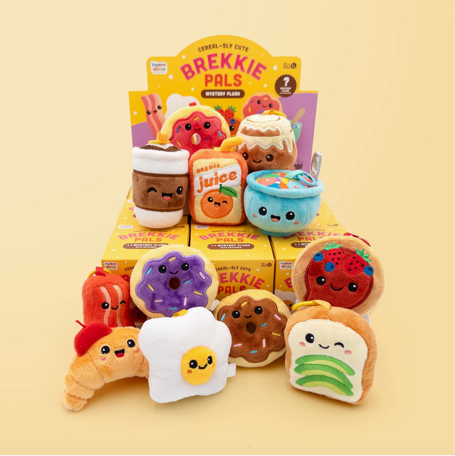 Plush toys resembling food items with their packaging on a beige background - Little-ish