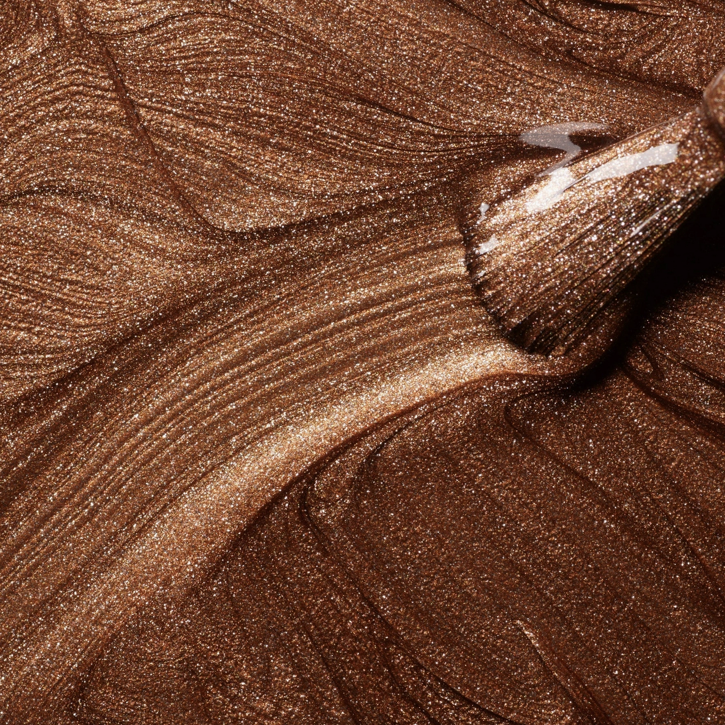 Close-up of brown glittery makeup swatch