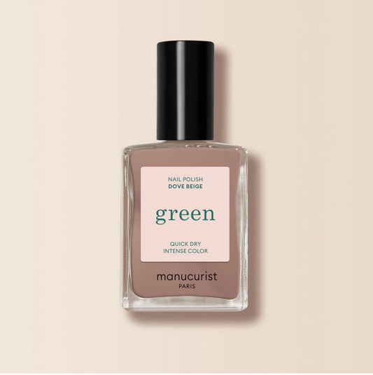 Manucurist nail polish bottle with a beige label on a beige background