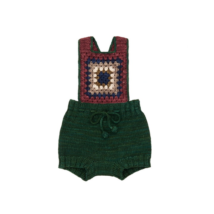 Knitted romper with a colorful square pattern on a white background