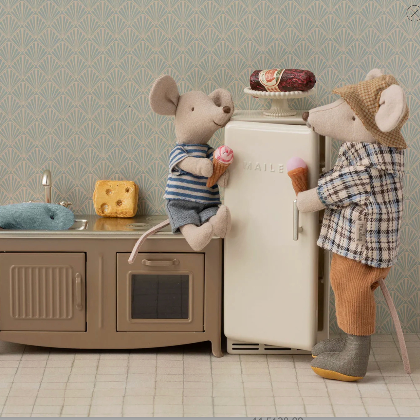 Two toy mice in a kitchen setting with a refrigerator and sink. - Little-ish
