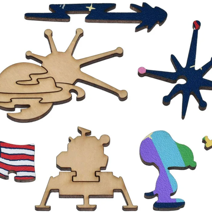 Collection of various wooden shapes on a white background