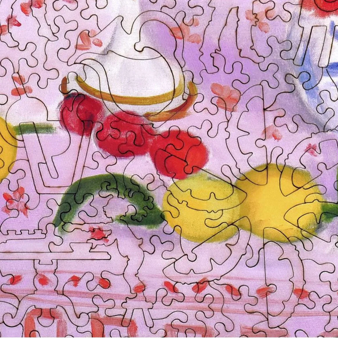 Partial puzzle with colorful elements on a white background - Little-ish