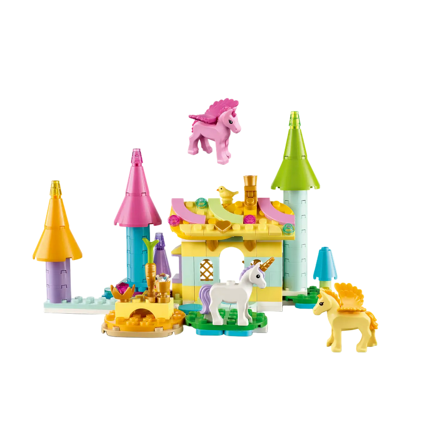 Toy castle with unicorn and castle pieces on a white background