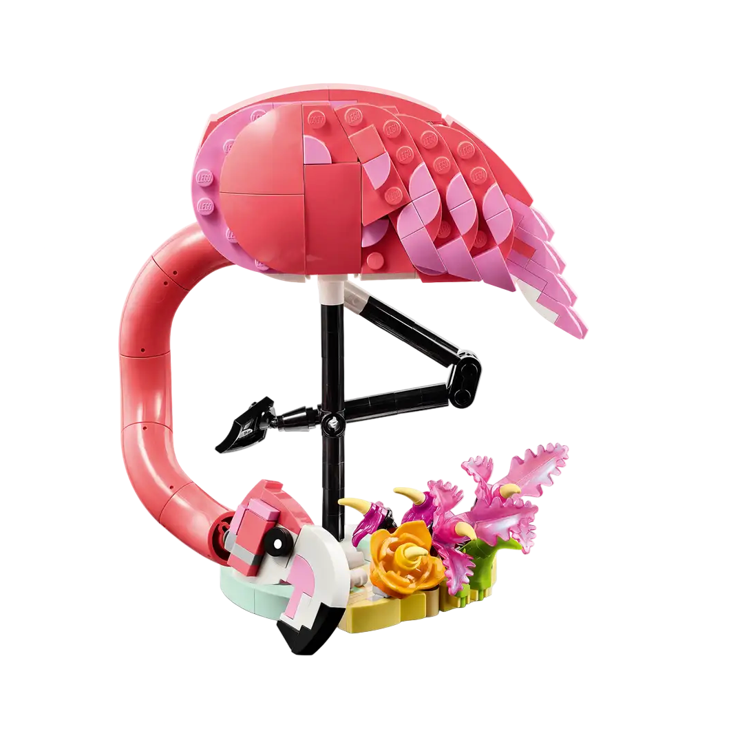 Toy flamingo made of interlocking bricks on a white background