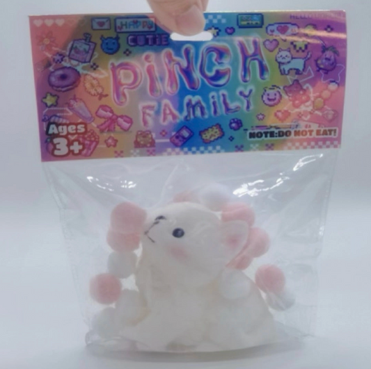 Plush toy in clear packaging with 'Punch Family' branding on a white background