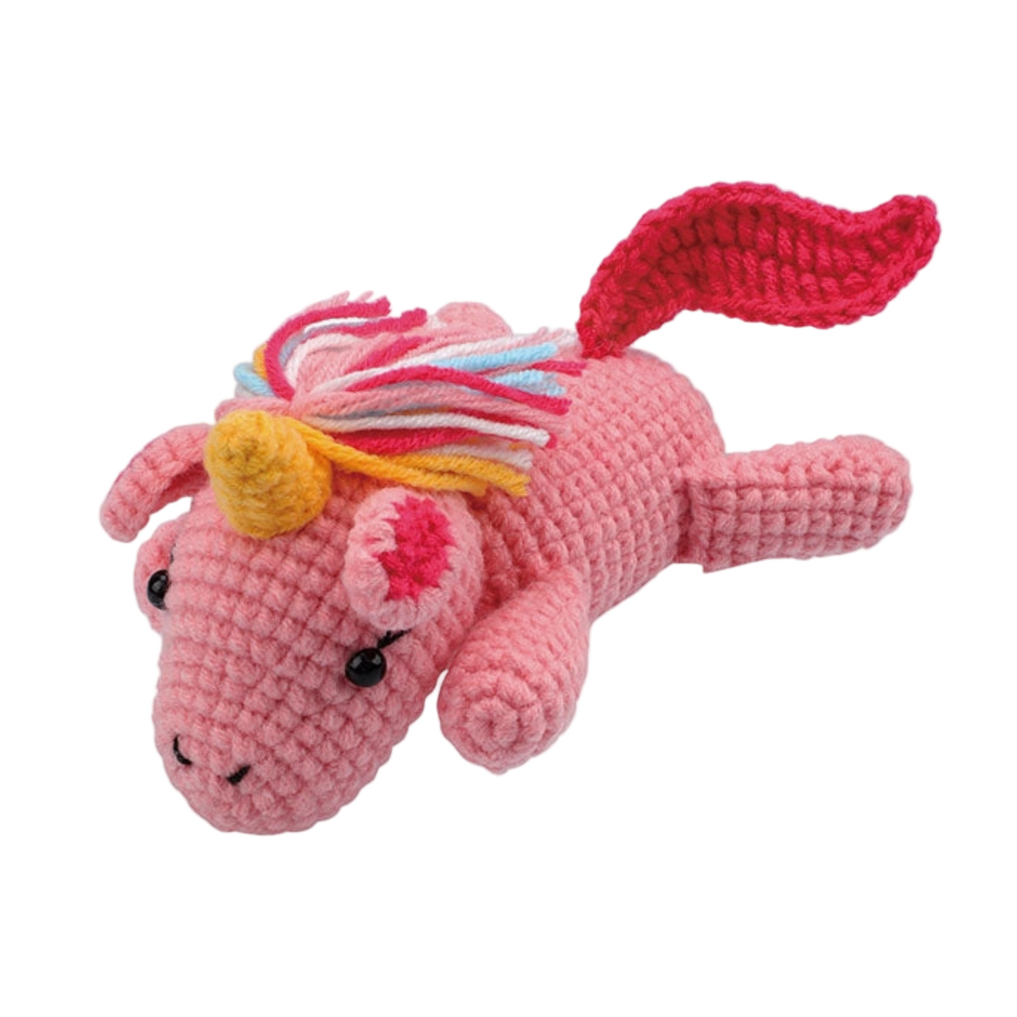 Pink crochet unicorn with a colorful mane on a white background