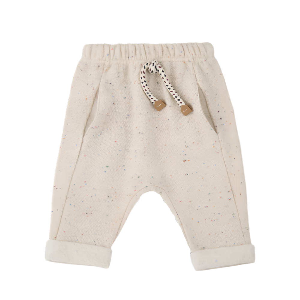 Beige baby pants with a rattle on a white background - Little-ish