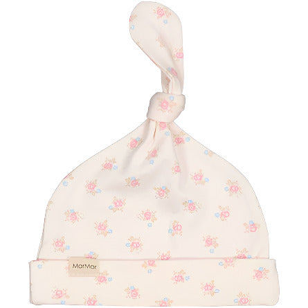 A beige newborn cap with a floral pattern, made of modal, organic cotton, and elastane, by Marmar Copenhagen. - Little-ish